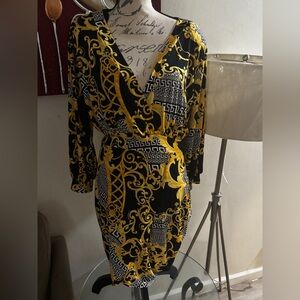 Elegant Black and Gold Patterned Dress